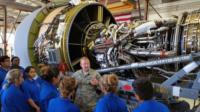 Staff Sgt. Shane Smith, a 433rd Maintenance Squadron jet engine technician, talks about the functions of a jet engine for a C-5M Super Galaxy and his experience as an Air Force Reservist to Air Force Junior Reserve Officer Training Corp students from John Jay High April 19, 2017 at Joint Base San Antonio-Lackland, Texas. The students toured engine and structural engineering shops at the 433rd Airlift Wing and also saw a Military Working Dog demonstration at the 802nd Security Force Squadron. (U.S. Air Force photo by Tech. Sgt. Carlos J. Trevino) (released)