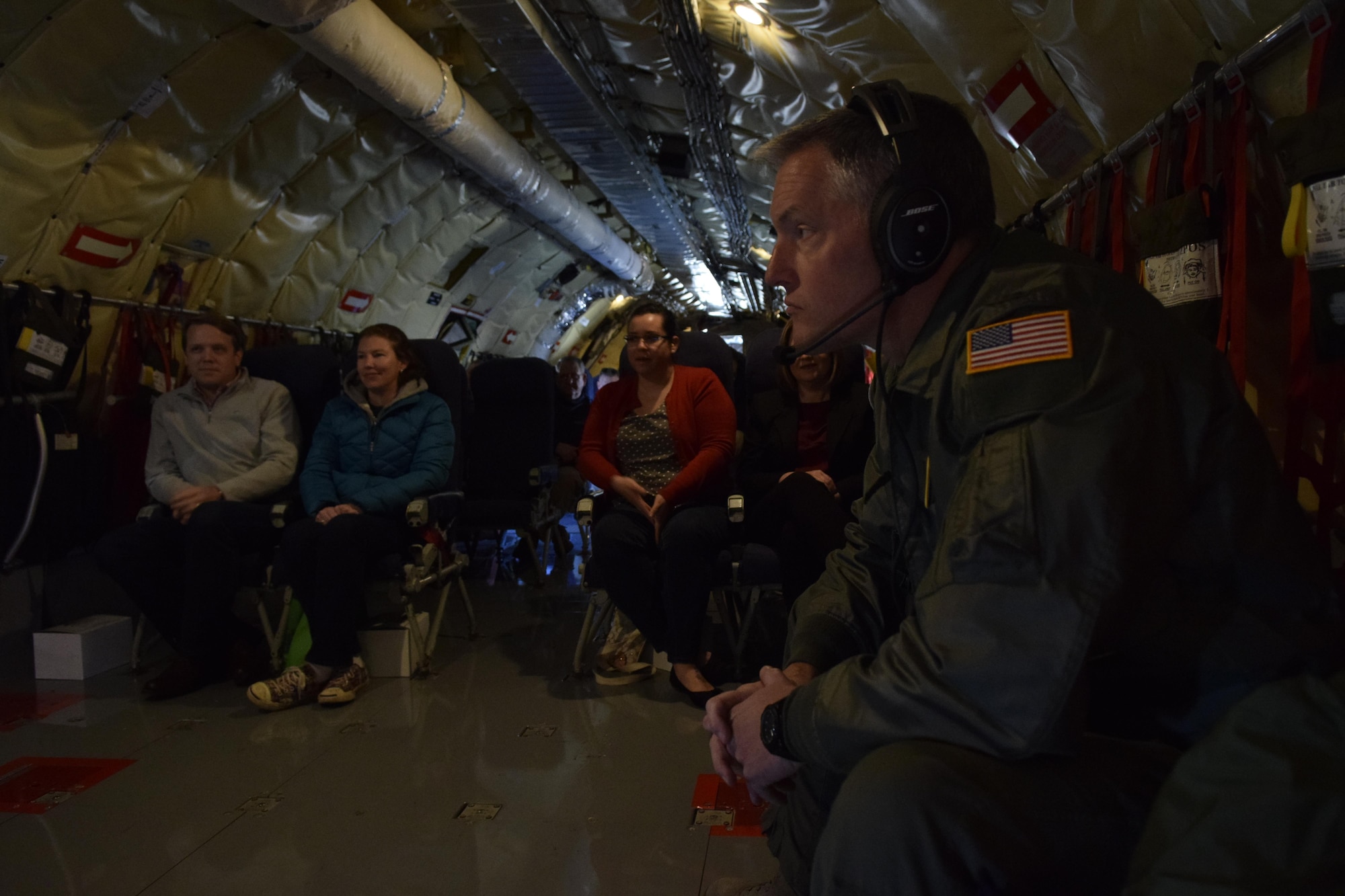 Col. Christopher Mathews, 72nd Aeromedical Squadron commander, right, sits inside KC-135R Stratotanker of the 507th Air Refueling Wing, Air Force Reserve Command, during a local training flight with members of the Tinker Air Force Base Honorary Commander's 2017 Class April 6, 2017, from Tinker Air Force Base, Oklahoma. The Honorary Commander's learned about the KC-135R Stratotanker's mission during an air refueling mission with F-16s of the 138th Fighter Wing, Oklahoma Air National Guard. (U.S. Air Force photo/Greg L. Davis)