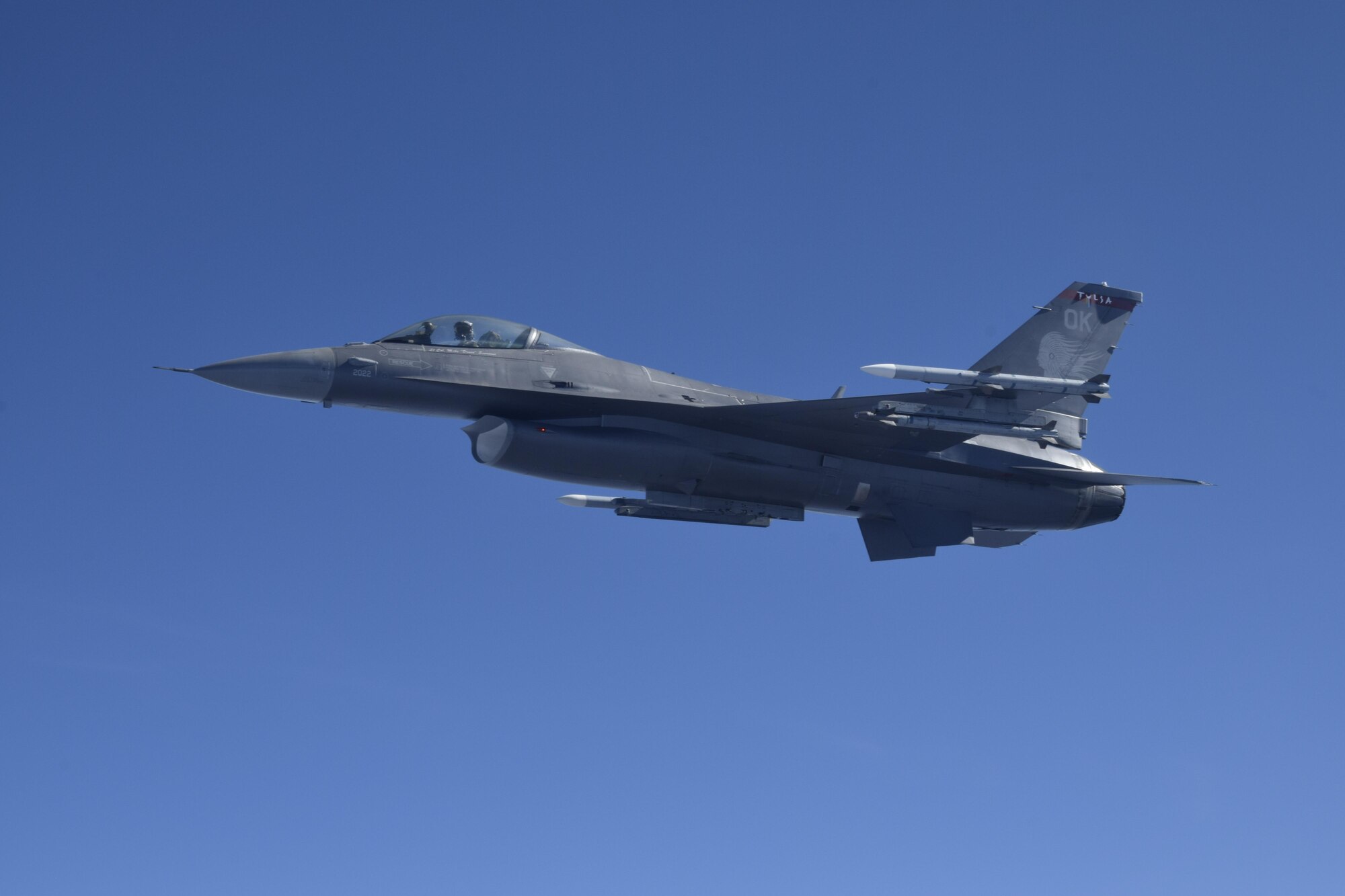 F-16C Fighting Falcon of the 138th Fighter Wing, Oklahoma Air National Guard, flies off the wing of a KC-135R Stratotanker of the 507th Air Refueling Wing, Air Force Reserve Command, during a training flight April 6, 2017, over Missouri. The F-16 has the HAVE GLAS radar reduction coating applied giving it a slightly different appearance to the more commonly seen paint scheme of previous years. (U.S. Air Force photo/Greg L. Davis)