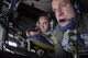 Master Sgt. Charles Danten, 465th Air Refueling Squadron, 507th Air Refueling Wing, Air Force Reserve Command, looks down on F-16s during a air refueling mission while Lt. Col. Lance Winner, 513th Air Control Group deputy commander, watches the action in the background April 6, 2017, from Tinker Air Force Base, Oklahoma. The 507th ARW conducted a local training flight with members of the Tinker Air Force Base Honorary Commander's 2017 Class to learn about the KC-135R Stratotanker's mission during an air refueling mission with F-16s of the 138th Fighter Wing, Oklahoma Air National Guard. (U.S. Air Force photo/Greg L. Davis)