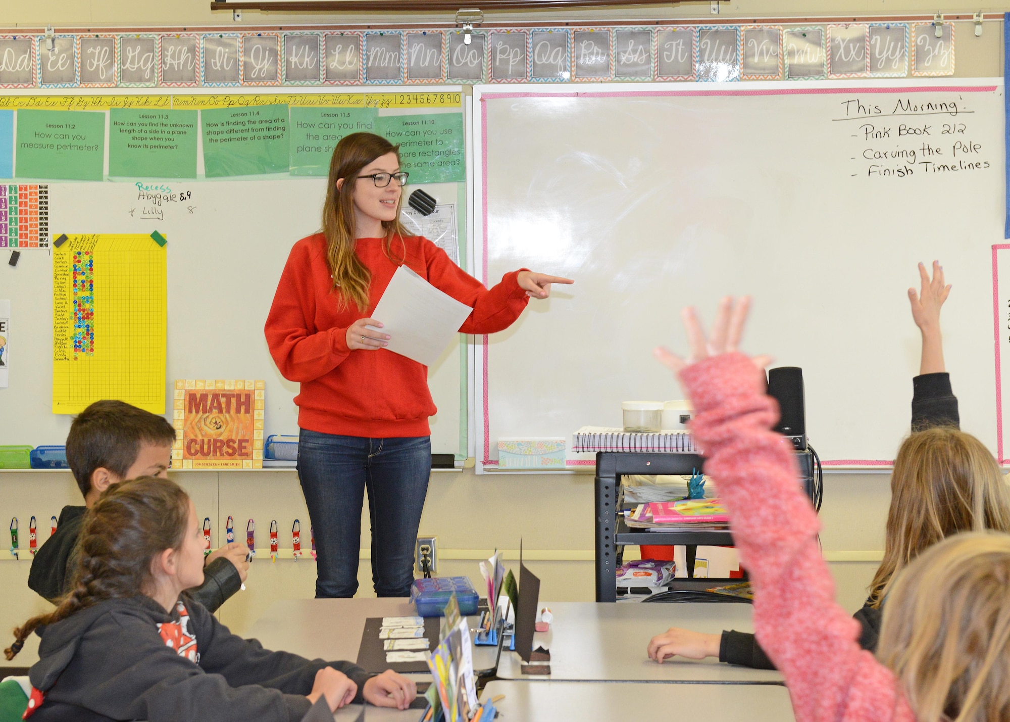 American Red Cross representative Haley Seibel talks to third-graders at Irving L. Branch Elementary April 11 about the Red Cross’ Pillowcase Project. Subjects touched on included managing stress during an emergency; what to do in case of a fire or earthquake; and what items the children should pack during an emergency in their pillowcase. (U.S. Air Force photo by Kenji Thuloweit)