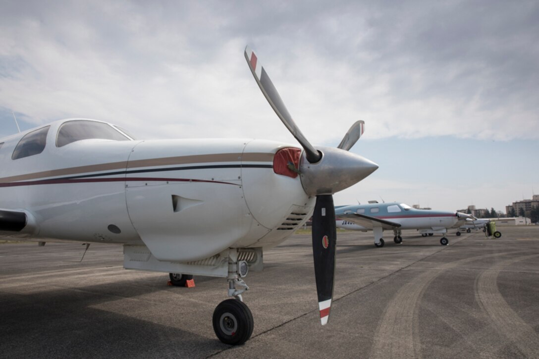 A civilian aircraft sits on the flightline ramp at Yokota Air Base, during the Kanto Plain Mid-Air Collision and Avoidance Conference, April 15, 2017. This is fifth time that the civilian planes were able to land at Yokota for the conference. (U.S. Air Force photo by Yasuo Osakabe)