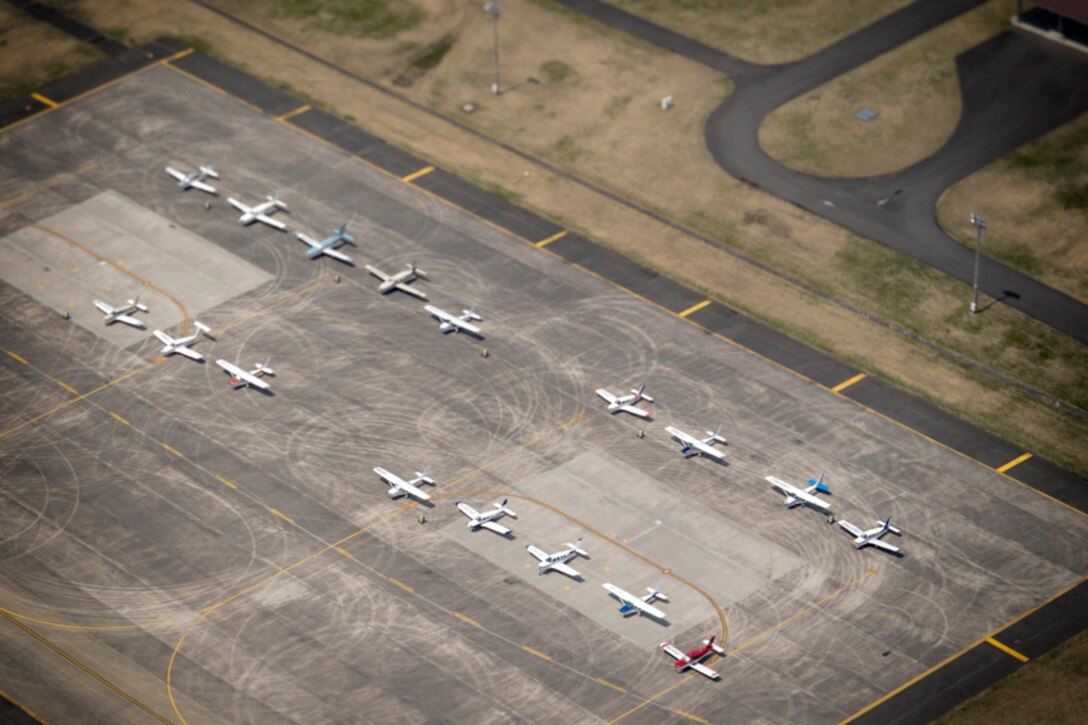 Twenty-six civilian aircraft landed at Yokota Air Base, Japan, during the Kanto Plain Mid-Air Collision and Avoidance Conference, April 15, 2017. This is fifth time that the civilian planes were able to land at Yokota for the conference. (U.S. Air Force photo by Yasuo Osakabe)