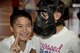 A child holds up two fingers and puts his ear to the gas mask to see if he can hear his friend talk during the Spring Break Junior Boot Camp event at Misawa Air Base, Japan, April 7, 2017. The participants were required to go through the in-processing line that included a legal brief, fingerprinting, medical review and gas mask fit test. (U.S. Air Force photo by Staff Sgt. Melanie A. Hutto)