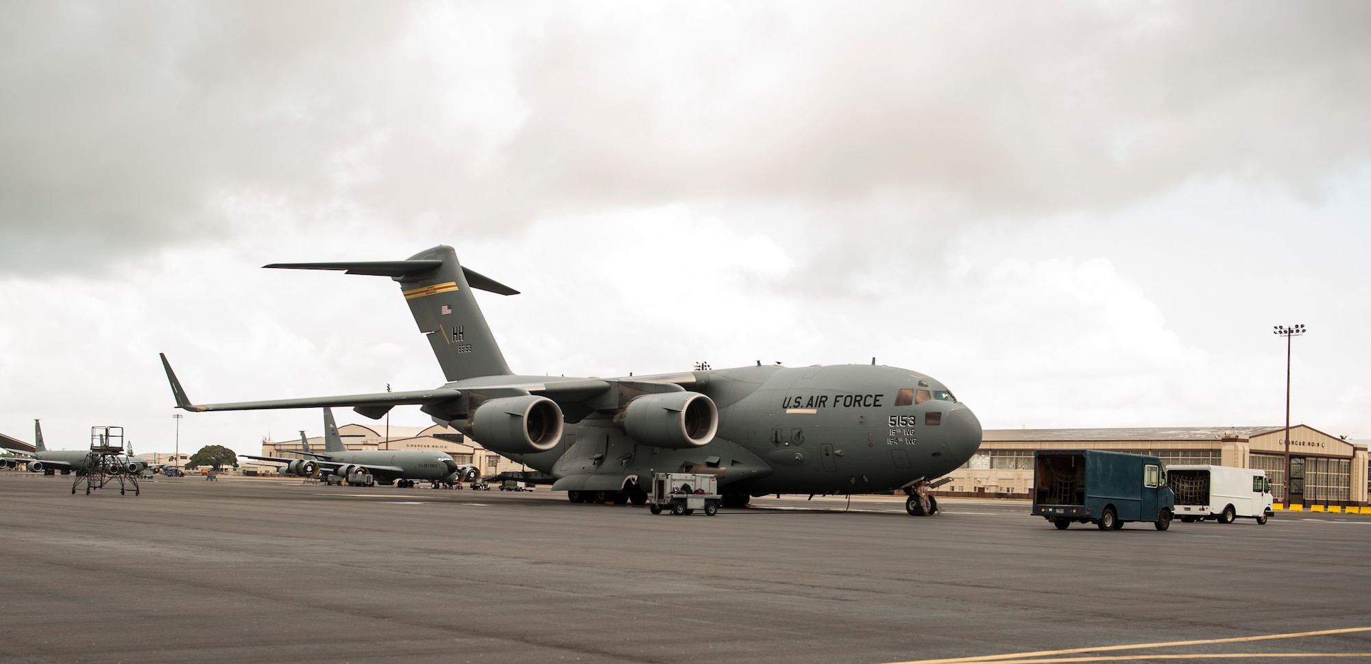Crews prepare a C-17 Globemaster III to transport personnel from Hickam Field to Wheeler Army Airfield for Exercise TROPIC THUNDER 2017 (XTT17) at Joint Base Pearl Harbor-Hickam, Hawaii, April 19, 2017.  XTT17 is a two part full spectrum readiness exercise hosted by the 15th Wing to test the individual, organizational and expeditionary readiness of the Airmen stationed at Hickam Field. (U.S. Air Force photo by Tech. Sgt. Heather Redman)