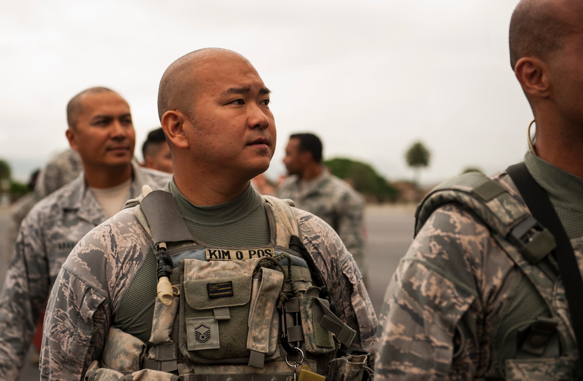 Master Sgt. Robert Kim, 154th Security Forces Squadron Air National Guard, boards a C-17 Globemaster III headed for Wheeler Army Airfield, Hawaii to support Exercise TROPIC THUNDER 2017 (XTT17), Joint Base Pearl Harbor-Hickam, Hawaii, April 19, 2017.  XTT17 is a two part full spectrum readiness exercise hosted by the 15th Wing to test the individual, organizational and expeditionary readiness of the Airmen stationed at Hickam Field. (U.S. Air Force photo by Tech. Sgt. Heather Redman)