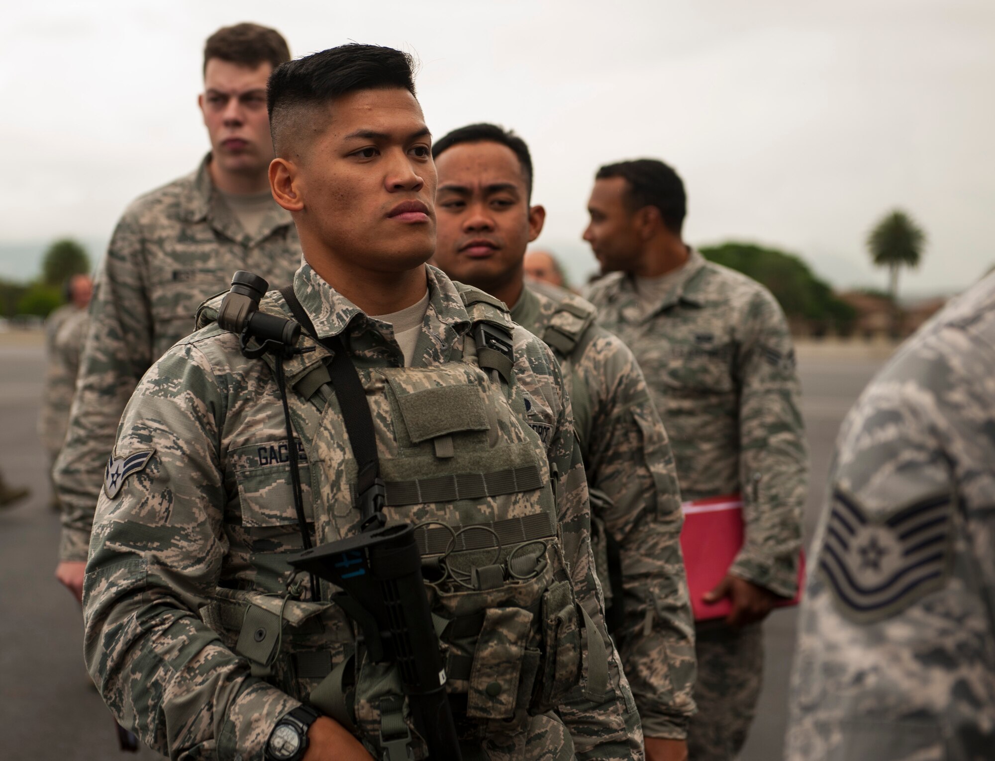 Airman 1st Class Juanito Gacusan, 154th Security Forces Squadron Air National Guard, boards a C-17 Globemaster III headed for Wheeler Army Airfield, Hawaii to support Exercise TROPIC THUNDER 2017 (XTT17), Joint Base Pearl Harbor-Hickam, Hawaii, April 19, 2017.  XTT17 is a two part full spectrum readiness exercise hosted by the 15th Wing to test the individual, organizational and expeditionary readiness of the Airmen stationed at Hickam Field. (U.S. Air Force photo by Tech. Sgt. Heather Redman)