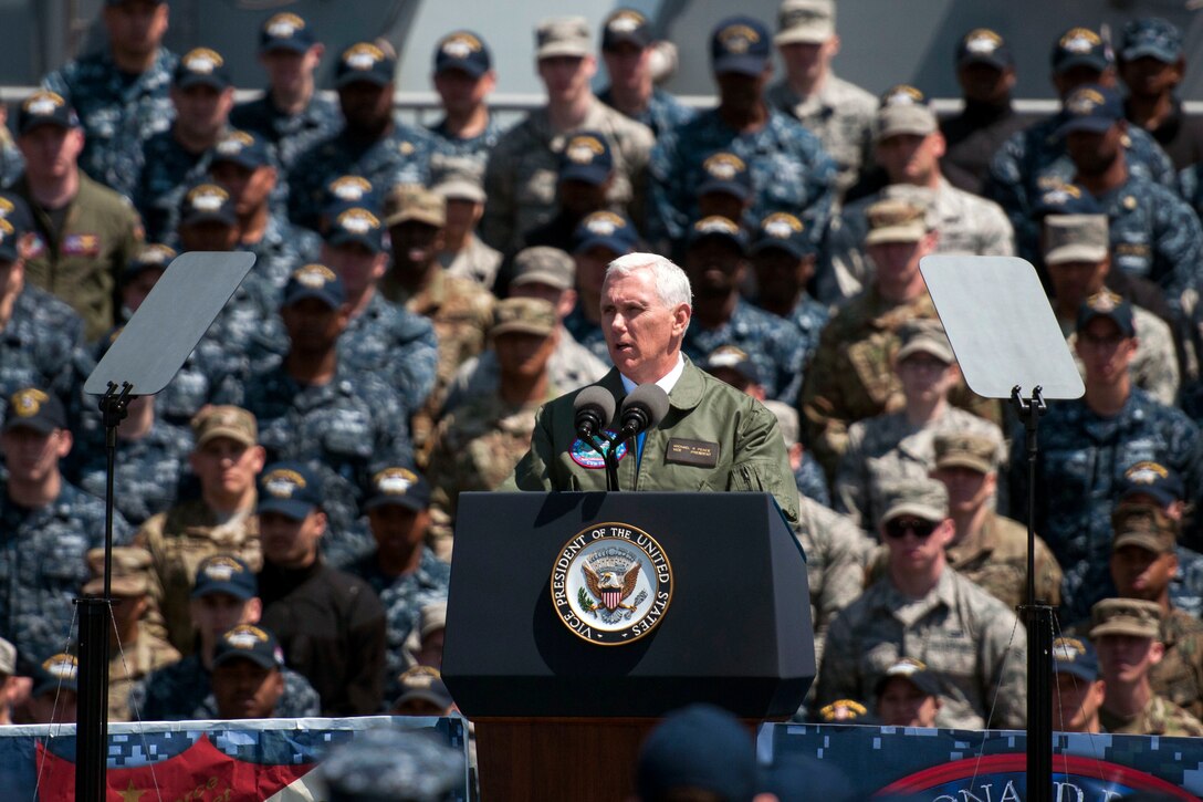 Vice President Mike Pence addresses service members on the flight deck of the USS Ronald Reagan in Yokosuka, Japan, April 19, 2017. Navy photo by Seaman Frank Joseph Speciale