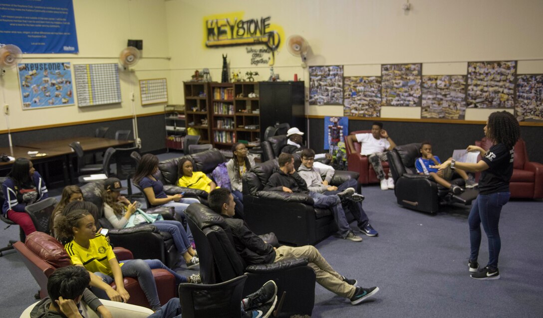 Raven Tongue, Child and Youth Program advisor speaks to members of the Keystone Club April 18, 2017, during a meeting at the 18th Force Support Squadron Teen and Youth Sports Center on Kadena Air Base, Japan. Top 3 Okinawa Outreach held an appreciation ceremony to recognize the youths for their acts of service to the local community. (U.S. Air Force photo by Senior Airman John Linzmeier)