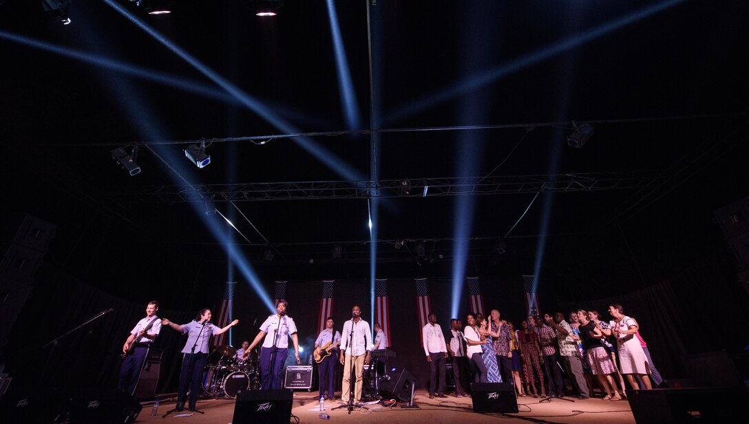 USAFE Band, Touch and Go, performs with local musicians during a concert in the community hosted by the U.S. Embassy in Ouagadougou, Burkina Faso, April 18, 2017. The band performed a one-hour set of Top-40 hits for the local community. (U.S. Air Force photo by Staff Sgt. Jonathan Snyder)
