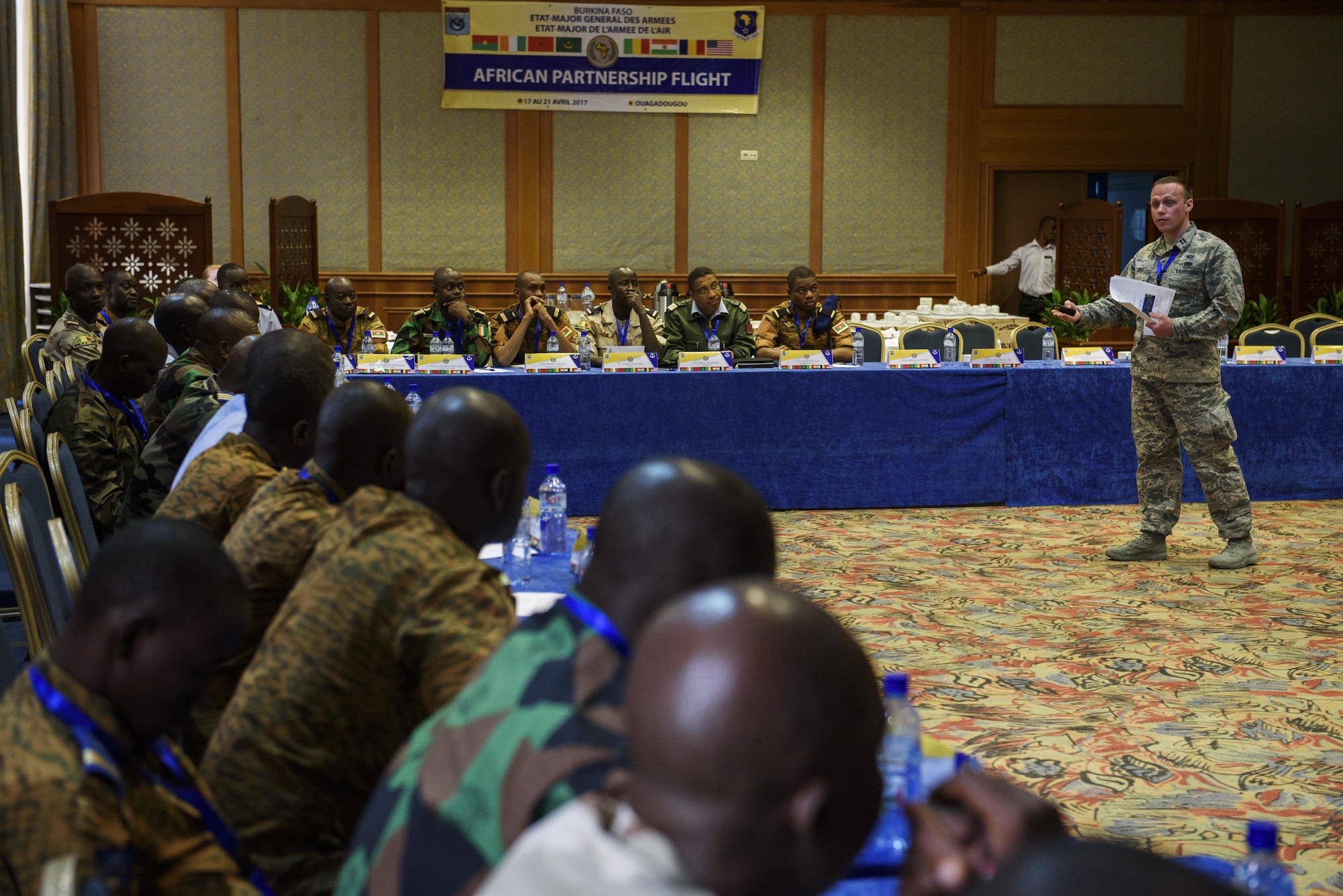 U.S. Air Force Capt. Robert Kent, 305th Aerial Port Squadron operations officer, speaks to African Partnership Flight participants during classroom discussion in Ouagadougou, Burkina Faso, April 18, 2017. Over the course of one week, instructors comprised of
U.S. Air Force will work with, Burkina Faso, Chad, Mali, Mauritania, Niger, Cote d’Ivoire and Morocco in classroom discussions and training workshops in maintenance and logistics support for light utility aircraft. It will examine the maintenance and logistics requirements necessary to forward deploy light utility aircraft in response to HADR efforts to include pre-departure preparation, execution and sustainment, and deployment conclusion. (U.S. Air Force photo by Staff Sgt. Jonathan Snyder)
