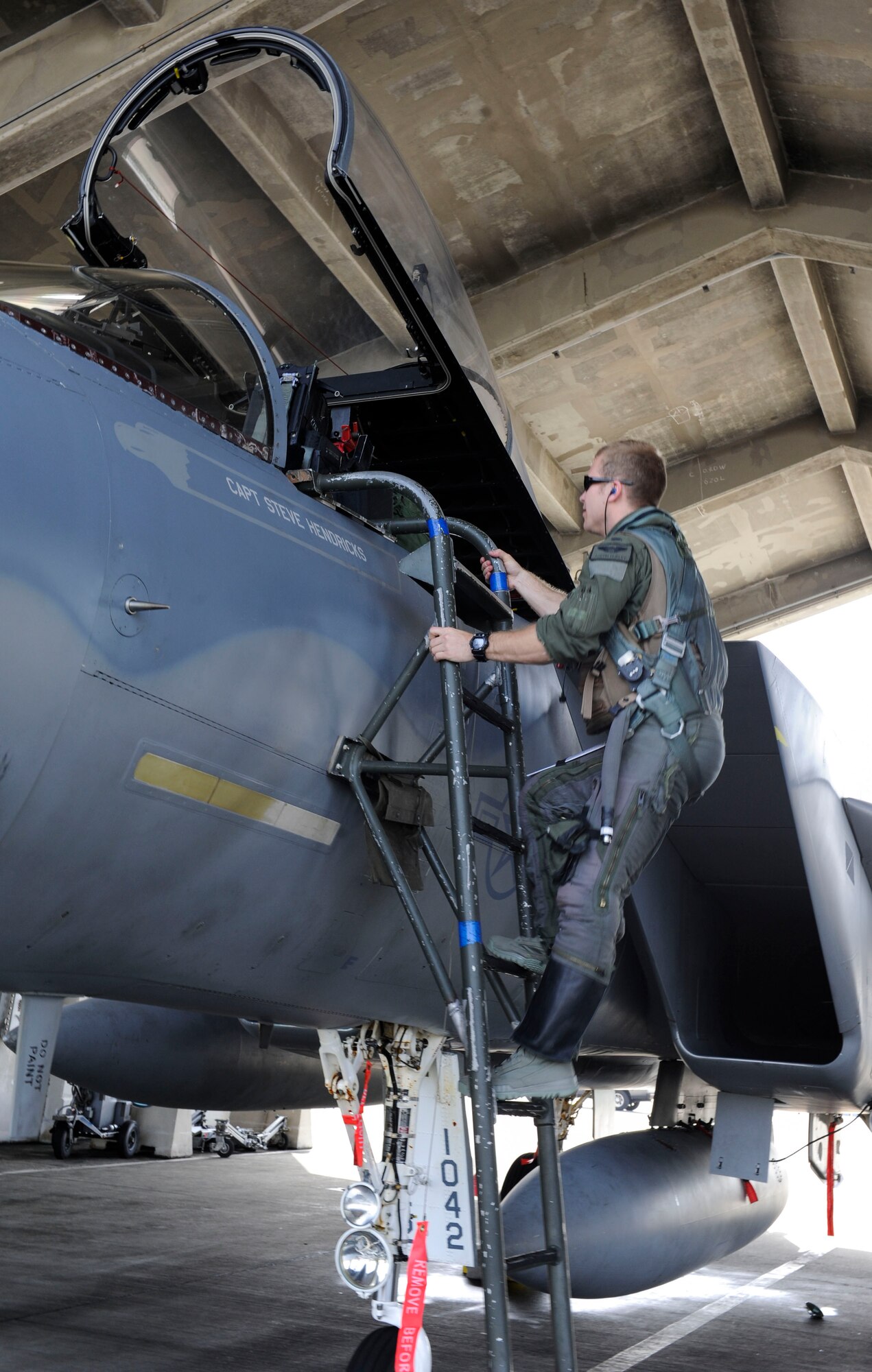 U.S. Air Force 1st Lt. Austin Hurley, 44th Fighter Squadron pilot, climbs up to the cockpit of an F-15 Eagle April 19, 2017, at Kadena Air Base, Japan. The 44th FS participates in multiple exercises throughout each year, maintaining partnerships with neighboring nations as well as peace and stability in the Pacific region. (U.S. Air Force photo by Senior Airman Lynette M. Rolen)