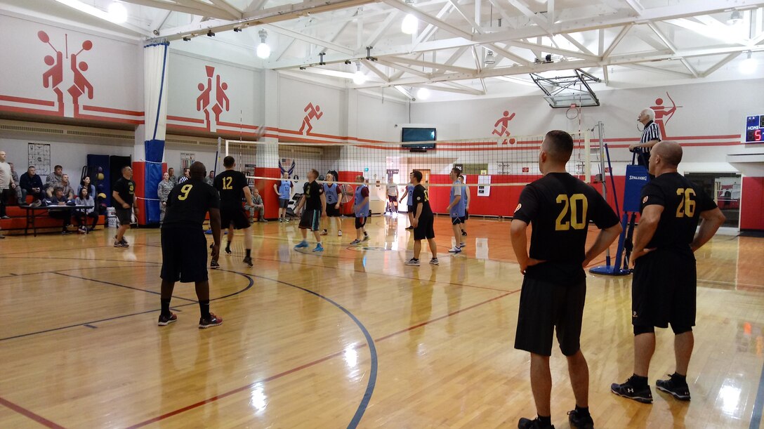 Members of the 911th Civil Engineer Squadron and the 911th Aerial Port Squadron participate in the final match of the 2017 Intramural Volleyball Tournament at the 911th Airlift Wing Fitness Center, Pittsburgh International Airport Air Reserve Station, Pa., April 8, 2017. The 2017 Intramural program is made up of four events: basketball, volleyball, softball and flag football. (U.S. Air Force curtesy photo by Tamra Davis)