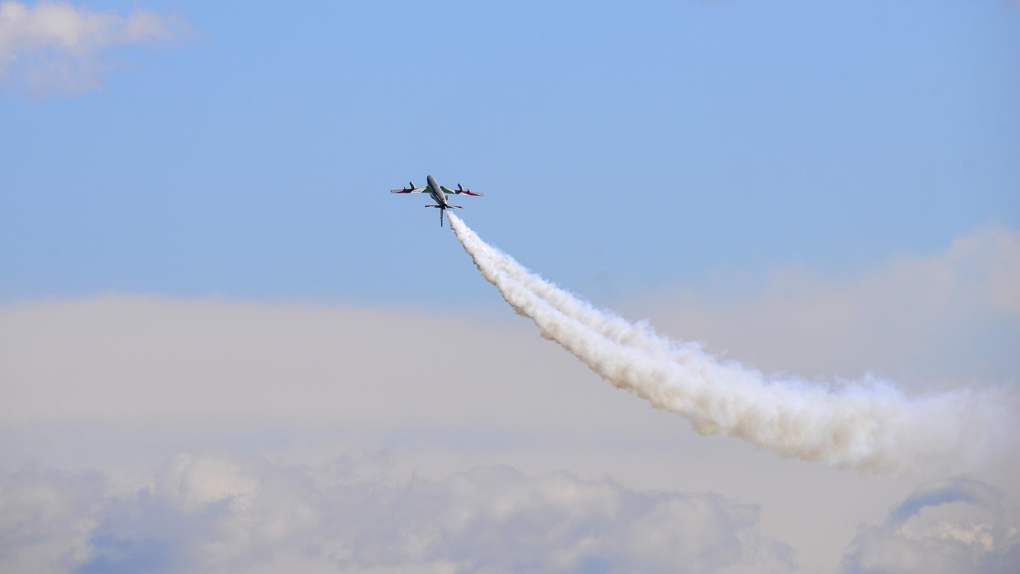 The Italian air force Frecce Tricolori aerobatics team, practiced flying formations over Aviano Air Base, Italy, April 19, 2017. The aerobatic team is comprised of 10 Aermacchi MB-339 aircraft and their pilots from Rivolto air force base, Italy. (U.S. Air Force photo by Senior Airman Cary Smith)