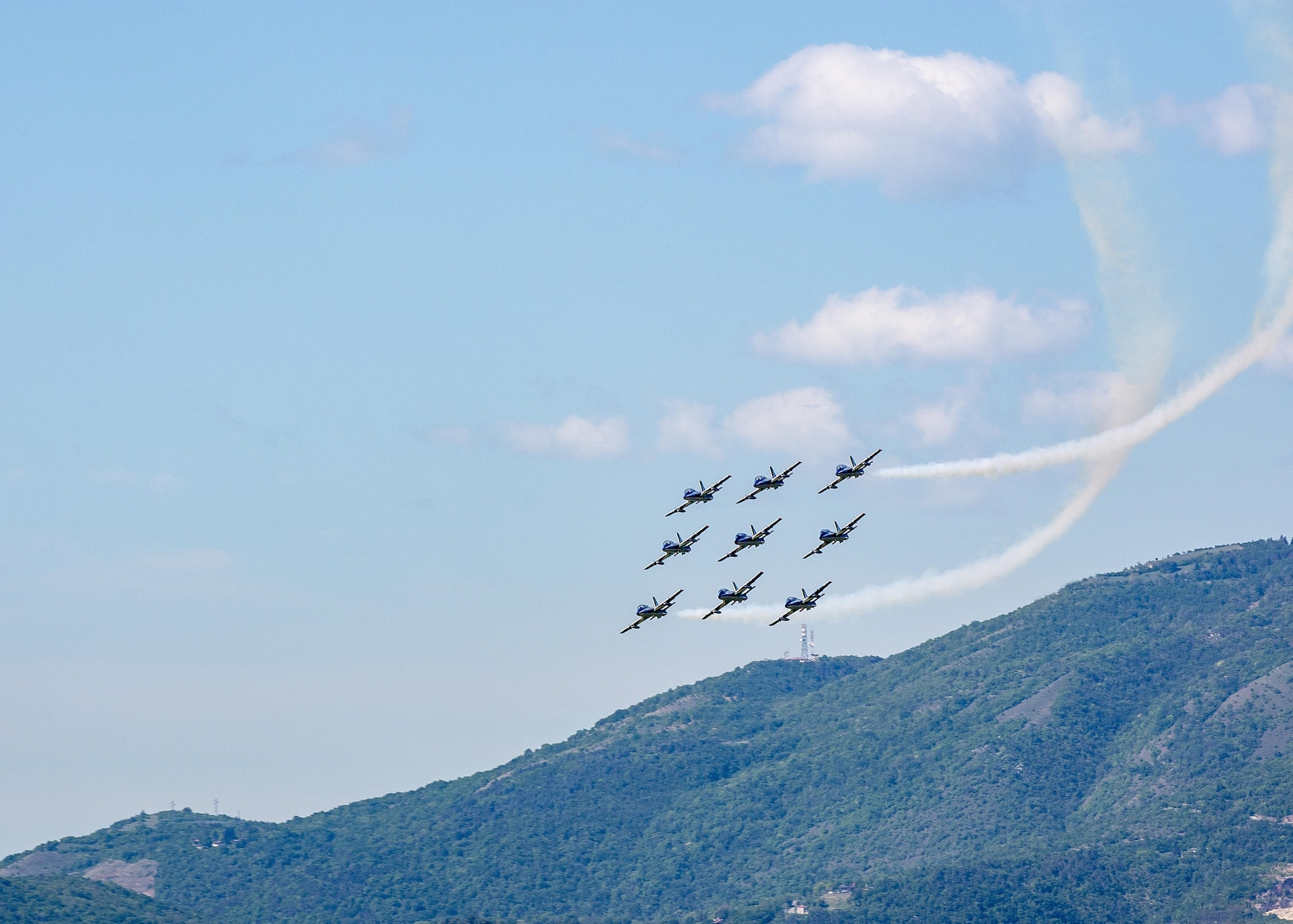 The Italian air force Frecce Tricolori aerobatics team, practiced flying formations over Aviano Air Base, Italy, April 19, 2017. They use the air space above Aviano each year to practice flying routines for their upcoming air shows. (U.S. Air Force photo by Senior Airman Cory W. Bush)