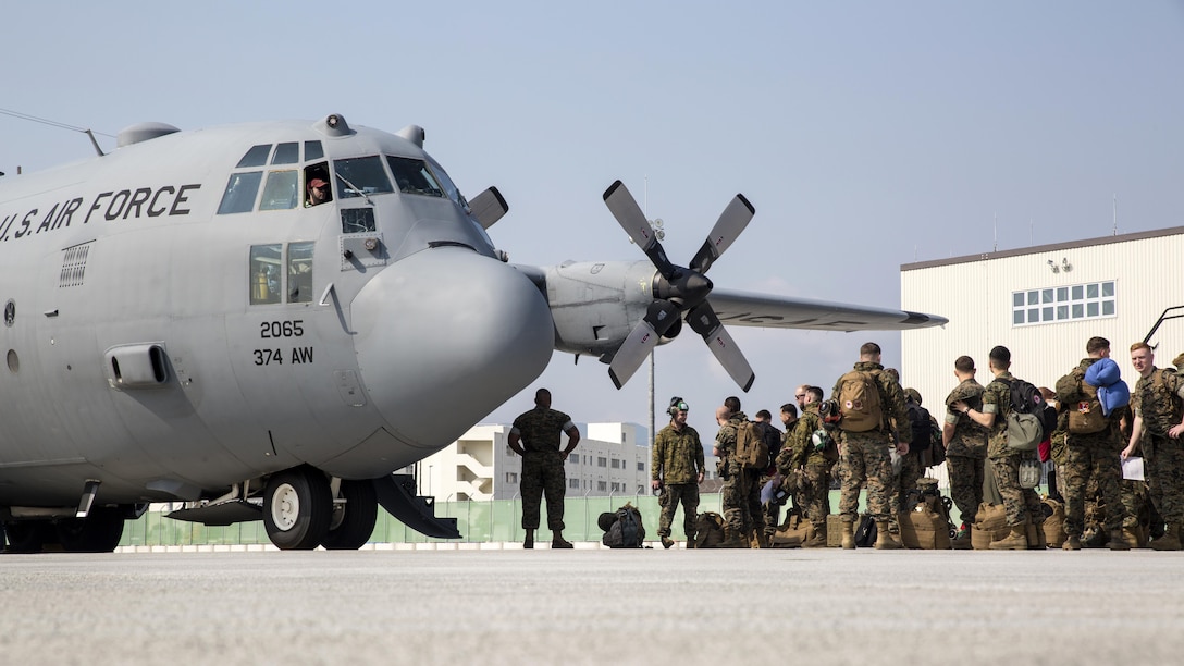 U.S. Marines with Marine Attack Squadron 311 board a C-130 Hercules during an exercise to Kunsan Air Base, Republic of Korea, from Marine Corps Air Station Iwakuni, Japan, April 12, 2017. VMA 311 is participating in Exercise MAX THUNDER 17, an operational readiness exercise built to promote interoperability between U.S. and ROK forces. This annual exercise helps to promote stability in the Asia-Pacific region. 
