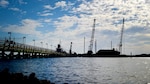 Contractors dredge the river during construction preparations for a new pier, which is used to receive jet fuel, at Joint Base Langley-Eustis, Va., April 17, 2017.  The new pier will be constructed out of concrete and will measure approximately 36 feet wide to give first responders access in times of emergency. (U.S. Air Force photo/Staff Sgt. Areca T. Bell)