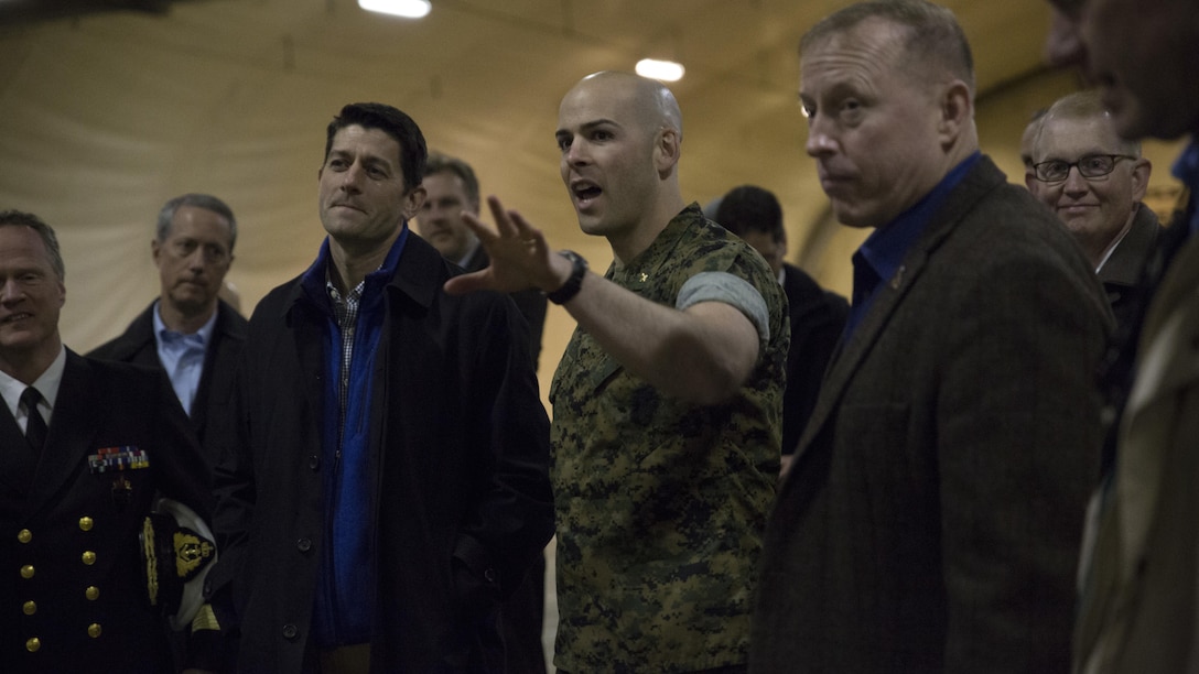 U.S. House of Representatives Speaker Paul Ryan of Wisconsin listens as U.S. Marine Corps Major Thomas Stona explains the capacity of the Marine Corps Prepositioning Program in Norway, April 18, 2017. Speaker Ryan and members of the House of Representatives, as a part of a congressional delegation, met to facilitate communication and idea sharing between the U.S. and Norway. MCPP-N is a lasting program between these two nations to store equipment forward and provide rapid-response capabilities to a wide range of military operations in support of NATO allies and partners.