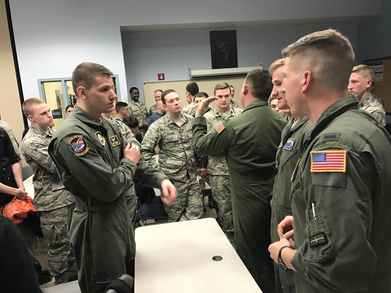 Cadet Bryan Reginald, a member of Kent State Reserve Officer Training Corp Detachment 630, talks with 1st Lt. John Kirin and 1st Lt. David Post, 757th Airlift Squadron navigators, during the ROTC Career Day April 6, 2017, at Kent State University. Several 910th Airlift Wing members participated to represent Air Force Reserve career options to the cadets. (Courtesy photo/Cadet Denise Nemeth, KSU ROTC)