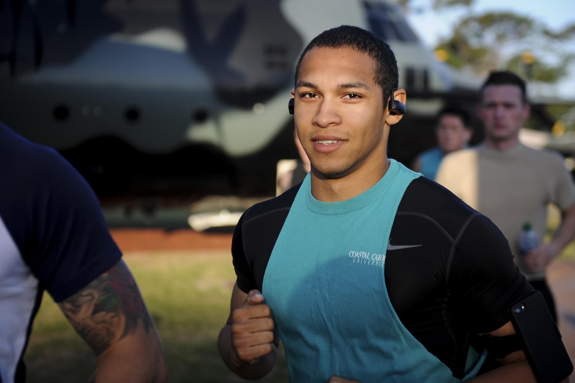 Airman 1st Class Russel Kanner, a contract administrator with the 1st Special Operations Contracting Squadron, runs during a Sexual Assault Prevention and Response 5-kilometer run at Hurlburt Field, Fla., April 19, 2017. Kanner participated in the 5k run in observance of Sexual Assault Prevention and Awareness Month. More than 250 runners participated in this event. (U.S. Air Force photo by Airman 1st Class Dennis Spain)