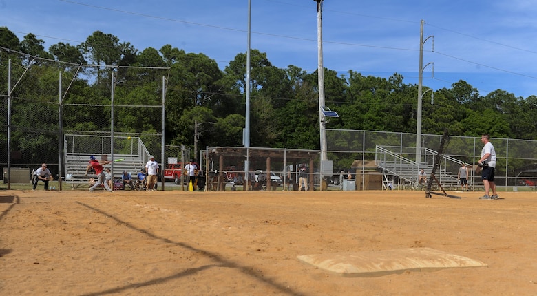 Airmen from the 96th Security Forces Squadron and Eglin Fire Emergency Services compete in the Battle of the Badges championship game at Hurlburt Field, Fla., April 14, 2017. The Battle of the Badges is a softball tournament in which police officers and firefighters from Okaloosa County, Hurlburt Field and Eglin Air Force Base compete to be known as the 2017 Battle of the Badges champion. (U.S. Air Force photo by Airman 1st Class Isaac O. Guest IV)