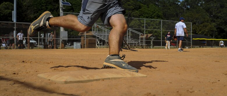 Airmen from the 96th Security Forces Squadron and Eglin Fire Emergency Services compete in the championship game of the Battle of the Badges at Hurlburt Field, Fla., April 14, 2017. Eglin Fire Emergency Services won the Battle of the Badges against the 96th Security Forces Squadron with a score of 10 to 9. (U.S. Air Force photo by Airman 1st Class Isaac O. Guest IV)