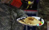 U.S. Army Reserve Soldiers enjoy a short respite from training at the USO Wisconsin’s pancake brunch, during Operation Cold Steel at Fort McCoy, Wis., April 16, 2017. Operation Cold Steel is the U.S. Army Reserve's crew-served weapons qualification and validation exercise to ensure that America's Army Reserve units and Soldiers are trained and ready to deploy on short-notice and bring combat-ready and lethal firepower in support of the Army and our joint partners anywhere in the world. (U.S. Army Reserve photo by Staff Sgt. Debralee Best, 84th Training Command)
