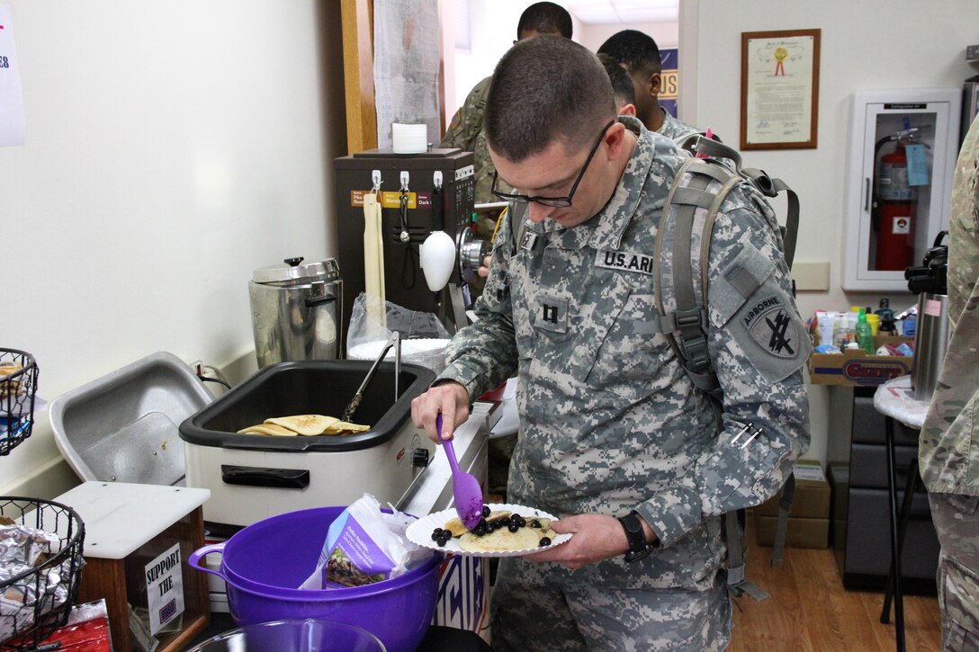 U.S. Army Reserve Soldiers enjoy a short respite from training at the USO Wisconsin’s pancake brunch, during Operation Cold Steel at Fort McCoy, Wis., April 16, 2017. Operation Cold Steel is the U.S. Army Reserve's crew-served weapons qualification and validation exercise to ensure that America's Army Reserve units and Soldiers are trained and ready to deploy on short-notice and bring combat-ready and lethal firepower in support of the Army and our joint partners anywhere in the world. (U.S. Army Reserve photo by Staff Sgt. Debralee Best, 84th Training Command)