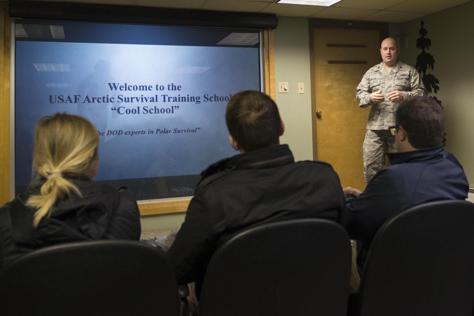 U.S. Air Force Lt. Col. William Mercer, the 66th Training Squadron detachment 1 commander, briefs Congressional staff delegates about Arctic Survival Training School (Cool School) 18 April, 2017, at Eielson Air Force Base, Alaska. Cool School teaches the fundamentals of surviving in the arctic environment, everything from building a shelter to catching and cooking food. (U.S. Air Force photo by Airman Eric M. Fisher)
