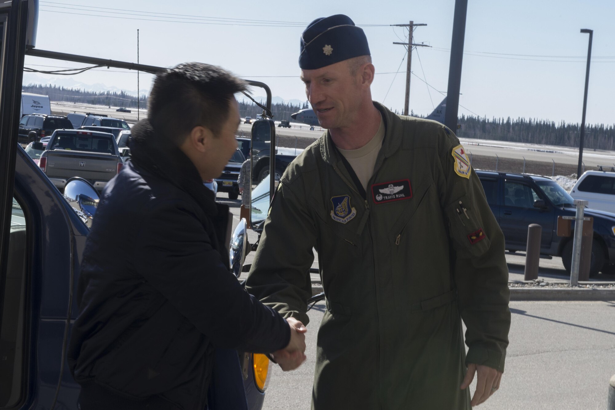 U.S. Air Force Lt. Col. Travis Ruhl, the 353rd Combat Training Squadron (CTS) commander, greets Alex Wong, foreign policy advisor and general counsel to Senator Tom Cotton, 18 April, 2017, at Eielson Air Force Base, Alaska. The 353rd CTS plans and conducts RED FLAG-Alaska, a series of Pacific Air Forces commander-directed field training exercises for U.S. forces, which provides joint offensive counter-air, interdiction, close air support, and large force employment training in a simulated combat environment. (U.S. Air Force photo by Airman Eric M. Fisher)