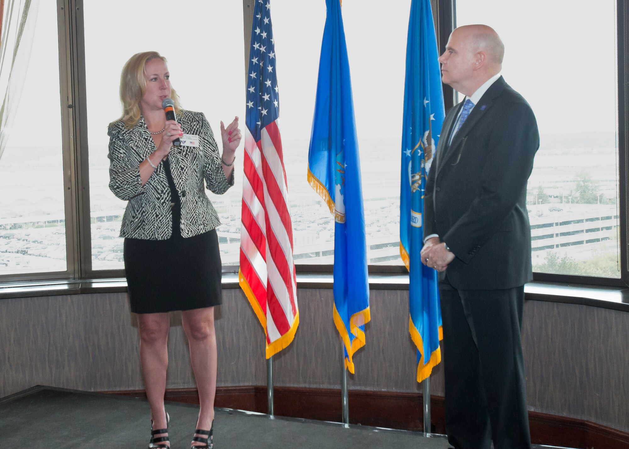 Michelle Ryan, president of the Air Force Association's D.W. Steele, Sr. Memorical Chapter, thanks Air National Guard Executive Director James J. Brooks at the 15th annual AFA Salute to the Air National Guard, held April 19, 2017 in Crystal City, Virginia. The AFA honored 12 ANG members across a broad range of specialites for their dedication and outstanding contributions to the success of the ANG and the overall Air Force mission. (U.S. Air National Guard photo by Staff Sgt. John E. Hillier)