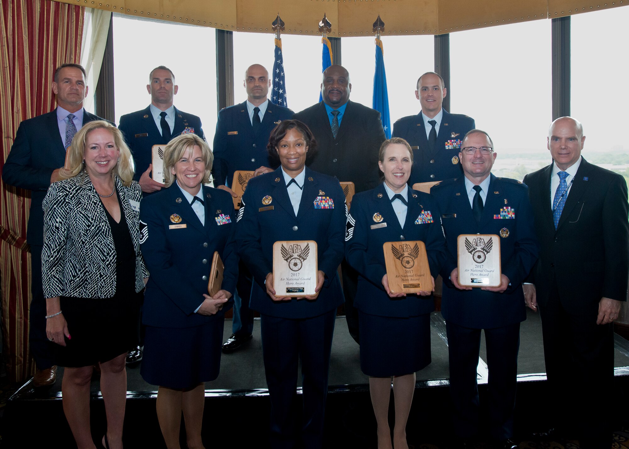 Air National Guard leadership and honorees pose at the 15th annual Air Force Association's Salute to the Air National Gaurd, held April 19, 2017, in Crystal City, Virginia. The AFA's D.W. Steele Sr. Memorial Chapter honored 12 ANG members across a broad range of specialties for their dedication and outstanding contributions to the success of the ANG and the overall Air Force mission. (U.S. Air National Guard photo by Staff Sgt. John E. Hillier)