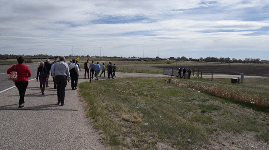 Industry Day attendees participate in a site survey at F.E. Warren Air Force Base, Wyo., April 18, 2017. The site survey was an opportunity for the attendees to see the land included in the Enhanced Use Lease proposal. 74 acres on the south border of the base are being opened to public bid for development as part of the EUL. More than thirty individuals came to the event, representing more than 15 property-development organizations. (U.S. Air Force photo by Glenn S. Robertson)