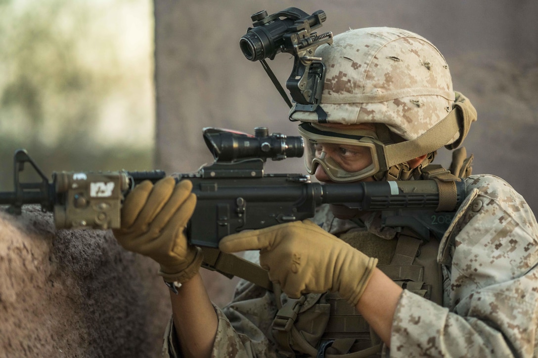 A Marine scans his sector during a heavy-Huey raid as part of Weapons and Tactics Instructors course 2-17 at Yuma Proving Grounds, Ariz., April 12, 2017. Air Force photo by Tech. Sgt. Chris Hibben