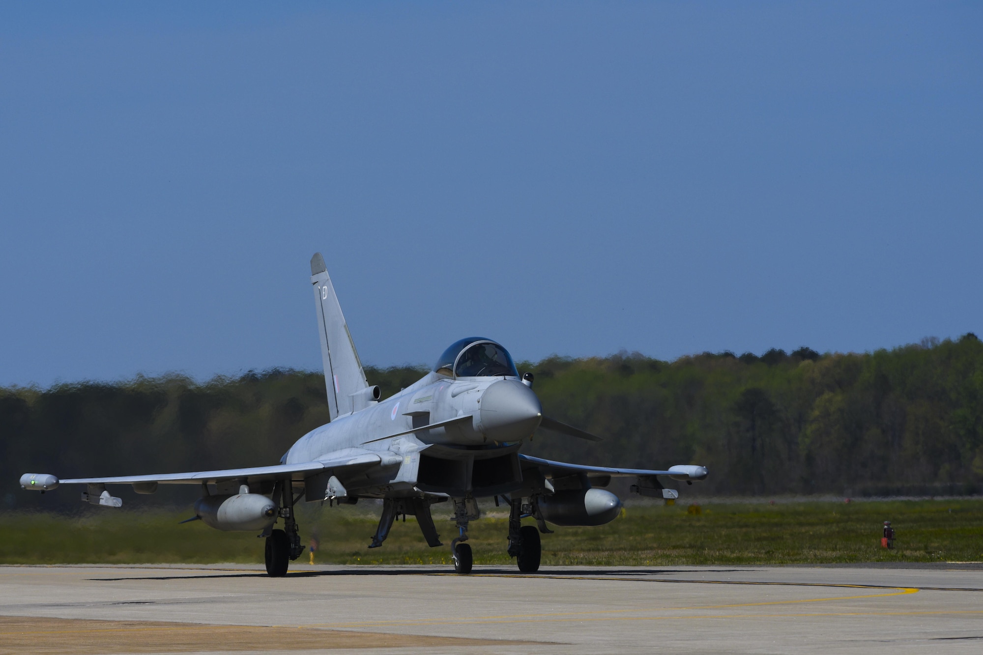 A Royal air force Eurofighter Typhoon, taxis on the runway during ATLANTIC TRIDENT 17 at Joint Base Langley-Eustis April 10, 2017. The exercise was designed to encourage sharing tactics, techniques and procedures with French air force and RAF partners against a range of potential threats, while leveraging U.S. Air Force fifth-generation capabilities. (U.S. Air Force photo/Airman 1st Class Anthony Nin Leclerec)