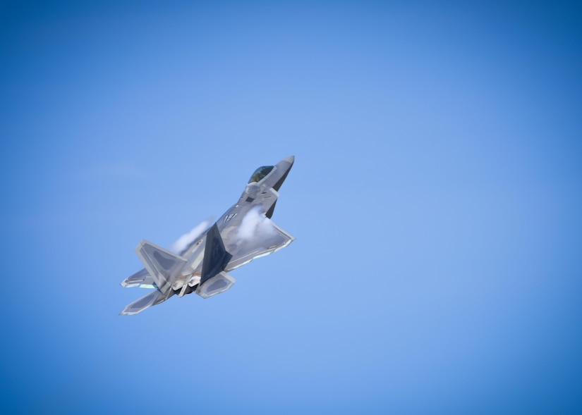 A U.S. Air Force F-22 Raptor, flies during ATLANTIC TRIDENT 17 at Joint Base Langley-Eustis, Va., April 17, 2017. The F-22, which is capable of receiving information from a multitude of airborne and ground based platforms, directs other assets to aid in mission success or away from potential threats. (U.S. Air Force photo/Airman 1st Class Anthony Nin Leclerec)