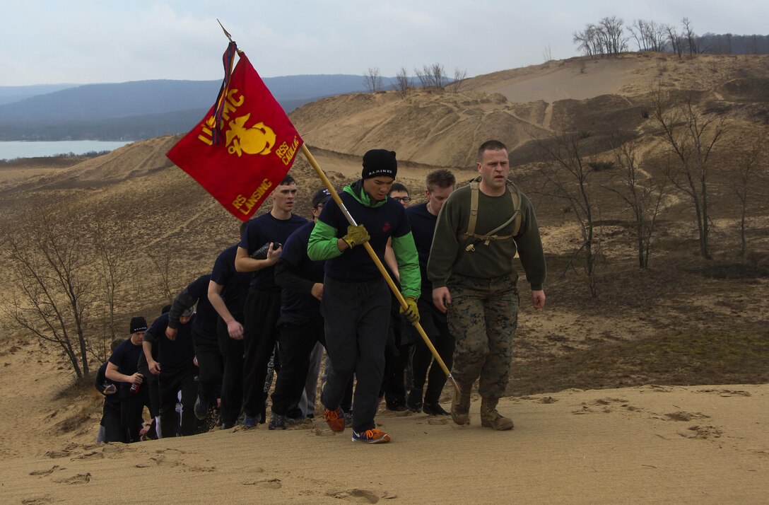 Future Marines hike with Marine Corps recruiters from Recruiting Sub-Station Cadillac at the Sleeping Bear Dunes National Lakeshore, Empire, Michigan, April 15, 2017. During the five-mile hike, the team rehearsed Marine Corps terminology as well as prepared for the physical demands of Marine Corps Recruit Depot, Parris Island, South Carolina. (U.S. Marine Corps photo by Sgt. Immanuel M. Johnson/Released)