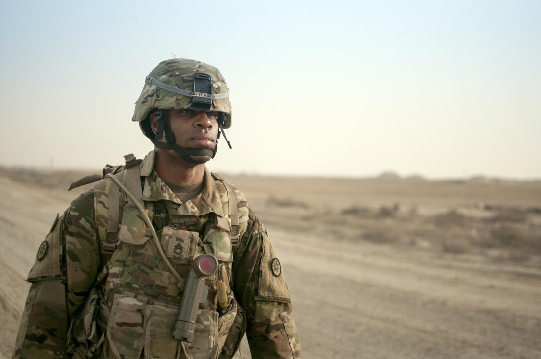 Staff Sgt. Andre Patterson, a Soldier with the 316th Sustainment Command (Expeditionary),  pushes towards the finish line of the 1st Sustainment Command (Theater) Best Warrior Competition 10-mile ruck march at Camp Arifjan, Kuwait April 16th, 2017.
(US Army Photo by Sgt. Christopher Bigelow)