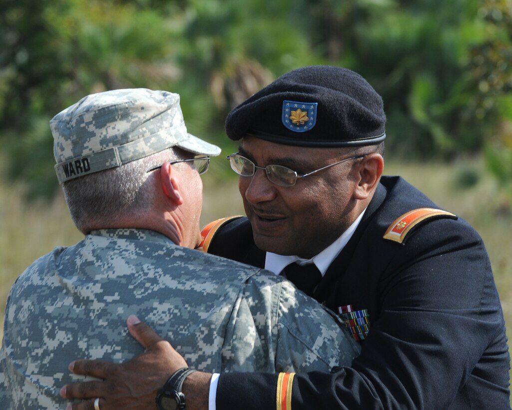 Army Chaplain (Maj.) Joe Ward, West Va. National Guard, embraces Maj. Dion Pandy, a signal officer at the Pentagon, at the funeral for Pandy’s father, retired Master Sgt. David Pandy Jr., in Ladyville, Belize on Mar. 30, 2017. Chaplain Ward is assigned to Task Force Jaguar and U.S.-Belize partnership exercise Beyond the Horizon 2017-Belize, a humanitarian assistance mission encompassing three health care events and four construction projects designed to improve the health and education infrastructure of Belizean communities.