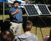 Mark Thompson, U.S. Army Engineering and Support Center, Huntsville public affairs specialist, explains the technology behind solar panels and the importance of renewable energy to students from Horizon Elementary School. More than 150 fifth-grade students from Horizon and Monte Sano elementary schools celebrated Earth Day April 20 at the Path to Nature on Redstone Arsenal. The children had a day full of educational activities that allowed them to learn more about the environment and why it is important to Redstone Arsenal and the surrounding community.