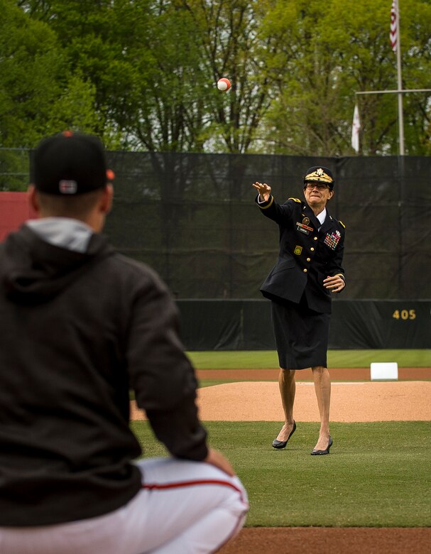 Brig. Gen. Marion Garcia, U.S. Army Reserve commanding general of the 200th Military Police Command, headquartered at Fort Meade, Md., throws the honorary pitch to catcher Austin Wynns before a celebration game for the Army Reserve's 109th birthday at Prince George's Stadium, April 19, 2017. The 200th MP Cmd. is located less than 20 miles from the stadium, and sought this opportunity to engage with the local community. The U.S. Army Reserve's official birthday is on April 23. (U.S. Army Reserve photo by Master Sgt. Michel Sauret)