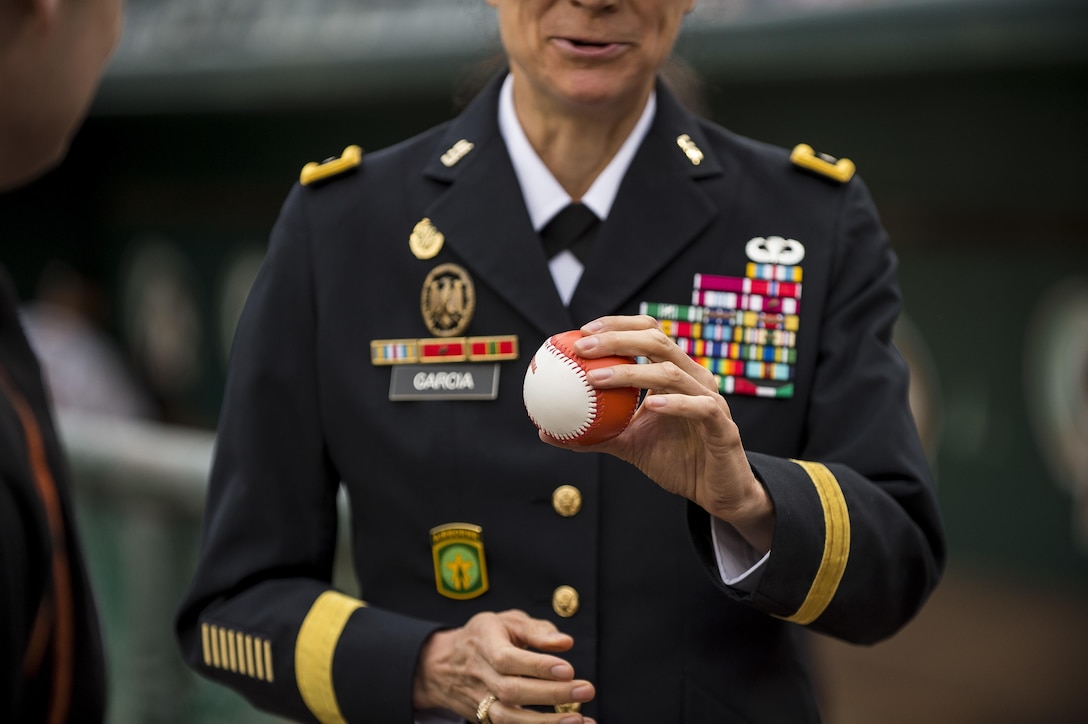 Brig. Gen. Marion Garcia, U.S. Army Reserve commanding general of the 200th Military Police Command, headquartered at Fort Meade, Md., hold the honorary baseball she would later pitch during a celebration event for the Army Reserve's 109th birthday at Prince George's Stadium, April 19, 2017. The 200th MP Cmd. is located less than 20 miles from the stadium, and sought this opportunity to engage with the local community. The U.S. Army Reserve's official birthday is on April 23. (U.S. Army Reserve photo by Master Sgt. Michel Sauret)