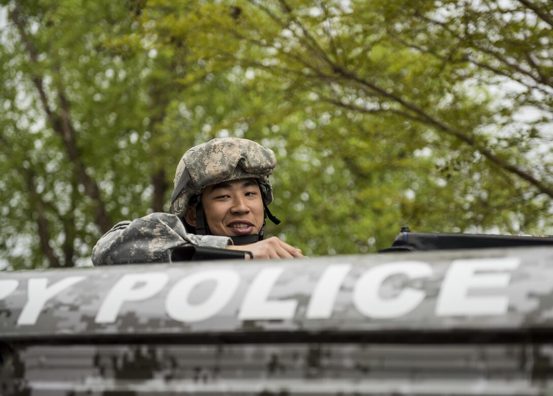 Spc. David Huh, U.S. Army Reserve Soldier from the 200th Military Police Command, headquartered at Fort Meade, Md., jokes around during a celebration of the Army Reserve's 109th birthday with the Bowie Baysox baseball club at Prince George's Stadium, April 19, 2017. The 200th MP Cmd. is located less than 20 miles from the stadium, and sought this opportunity to engage with the local community. The U.S. Army Reserve's official birthday is on April 23. (U.S. Army Reserve photo by Master Sgt. Michel Sauret)