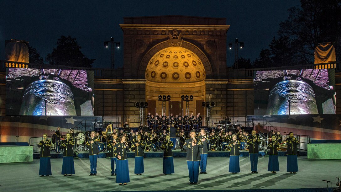 Soldiers rehearse for a public concert hosted by the U.S. Army Military District of Washington at the Women in Military Service for America Memorial at Arlington National Cemetery, Va., April 20, 2017. The show honors and celebrates the contributions of soldiers, first responders, nurses and teachers. DoD photo by EJ Hersom