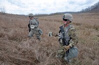 U.S. Army Reserve Spc. Aaron Elliott, left, and Sgt. Daniel Patrick, both with the 979th Mobility Augmentation Company, 478th Engineer Battalion, 926th Engineer Brigade, 412th Theater Engineer Command, based in Lexington, Ky., reel back a Bangalore torpedo shock tube, blasting cap and initiator during the company's training at Wilcox Range on Fort Knox, Ky., March 30, 2017. This was part of Engineer Qualification Table (EQT) VIII. The company went on to be certified in EQT XII  becoming the first U.S. Army Reserve unit to accomplish this feat. (U.S. Army Reserve Photo by Sgt. 1st Class Clinton Wood)