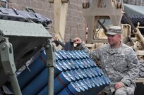 U.S. Army Reserve Cpl. Nicholas Vahle with the 979th Mobility Augmentation Company, 478th Engineer Battalion, 926th Engineer Brigade, 412th Theater Engineer Command, based in Lexington, Ky., pauses to look at 40 training mine canisters in one panel of a M136 Volcano weapons system during the company's training at Wilcox Range on Fort Knox, Ky.,April 1, 2017. This was part of Engineer Qualification Table XII. This company was the first U.S. Army Reserve unit to accomplish this feat. (U.S. Army Reserve Photo by Sgt. 1st Class Clinton Wood)