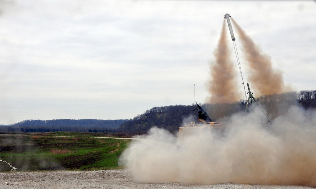 The MK22 Mod 4 rocket from a Mine Clearing Line Charge belonging to the 979th Mobility Augmentation Company, 478th Engineer Battalion, 926th Engineer Brigade, 412th Theater Engineer Command, based in Lexington, Ky., launches during the company's training at Wilcox Range on Fort Knox, Ky., April 1, 2017. This was part of Engineer Qualification Table XII. This company was the first U.S. Army Reserve unit to accomplish this feat. (U.S. Army Reserve Photo by Sgt. 1st Class Clinton Wood)