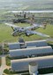 DAYTON, Ohio (04/2017) -- Four B-25 Mitchell bombers fly over the National Museum of the U.S. Air Force as part of the 75th Anniversary of the Doolittle Tokyo Raid. The aircraft pictured here are Panchito, Betty's Dream, God and Country, and Barbie III. (Photo courtesy of Greg Morehead from Warbird Digest)