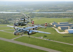 DAYTON, Ohio (04/2017) -- Four B-25 Mitchell bombers fly over the National Museum of the U.S. Air Force as part of the 75th Anniversary of the Doolittle Tokyo Raid. The aircraft pictured here are Panchito, Betty's Dream, God and Country, and Barbie III. (Photo courtesy of Greg Morehead from Warbird Digest)
