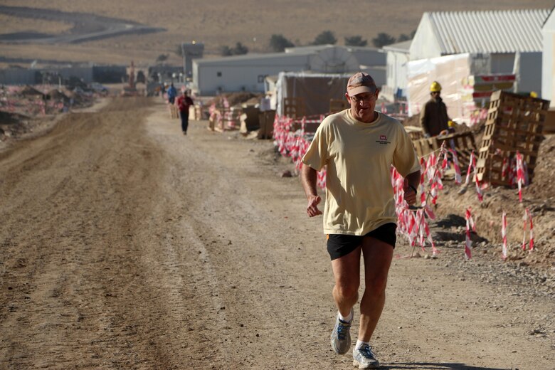 Jimmy Waddle, U.S. Army Corps of Engineers resident engineer for construction work at Mosul Dam, Iraq participates in a 5k run at the dam Nov. 24, 2016.  He frequently exercised to stay in shape while leading the effort to construct a housing complex, drill and grout the foundation of the dam, and inspect and repair the bottom outlet tunnels and equipment. Waddle returned to the U.S. Army Corps of Engineers Nashville District in March 2017 where he serves as chief of the Engineering and Construction Division. 